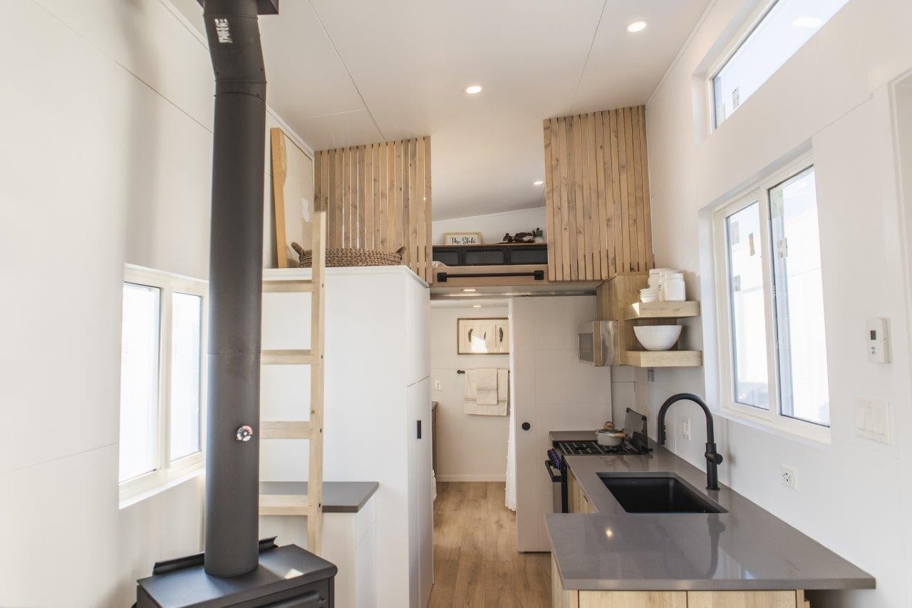 Tiny House on Wheels with wood stove fireplace